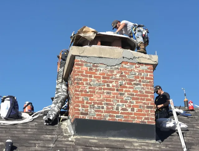Lawndale Chimney Sweep installing a custom chimney crown in Lawndale, CA